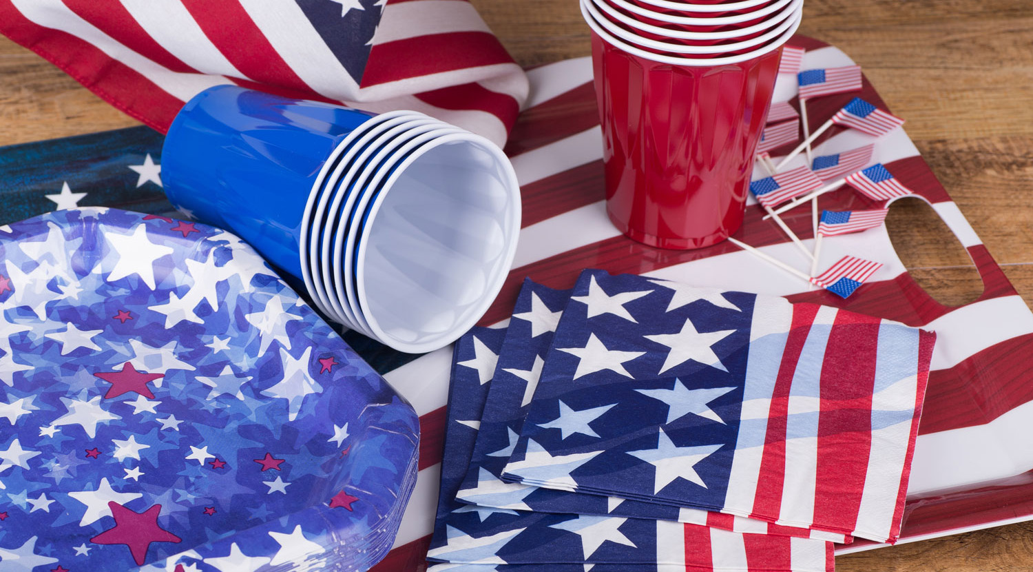 Patriotic assembly of American flag bags, cups, napkins, and plates